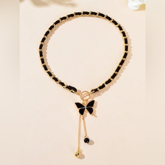 Elegant Gold and Black Butterfly Charm Necklace - Picture 2 of 4